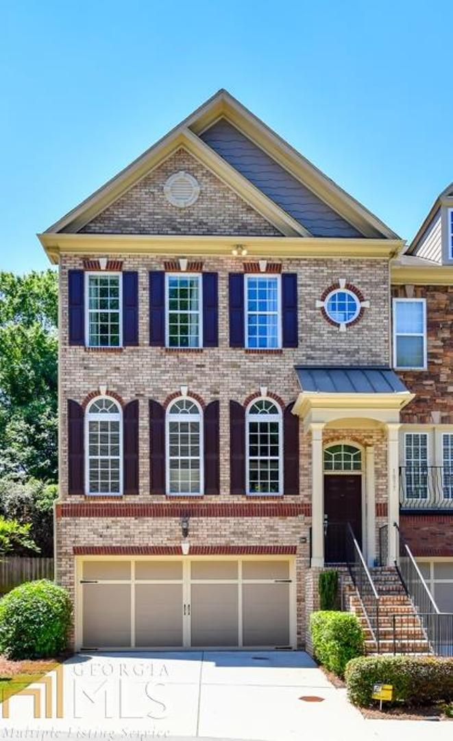 Rare end unit townhome at Overlook! Well-built 1-owner home in MINT condition. Beautiful bright living rm w/fireplace & marble hearth. Chef's kitchen w/upgraded granite counters, SS appliances, big island & custom cabinets. Huge owners suite w/vaulted ceiling & spa bath w/jetted tub. 2 guest bedrooms w/ensuite baths. Private rear deck- perfect for entertaining! 2 car garage w/great storage. Home theater speaker package, whole house audio, intercom, advanced security system. Walk to Emory, VA, CDC, and the Mason Mill & Houston Mill parks & walking/biking trails.
