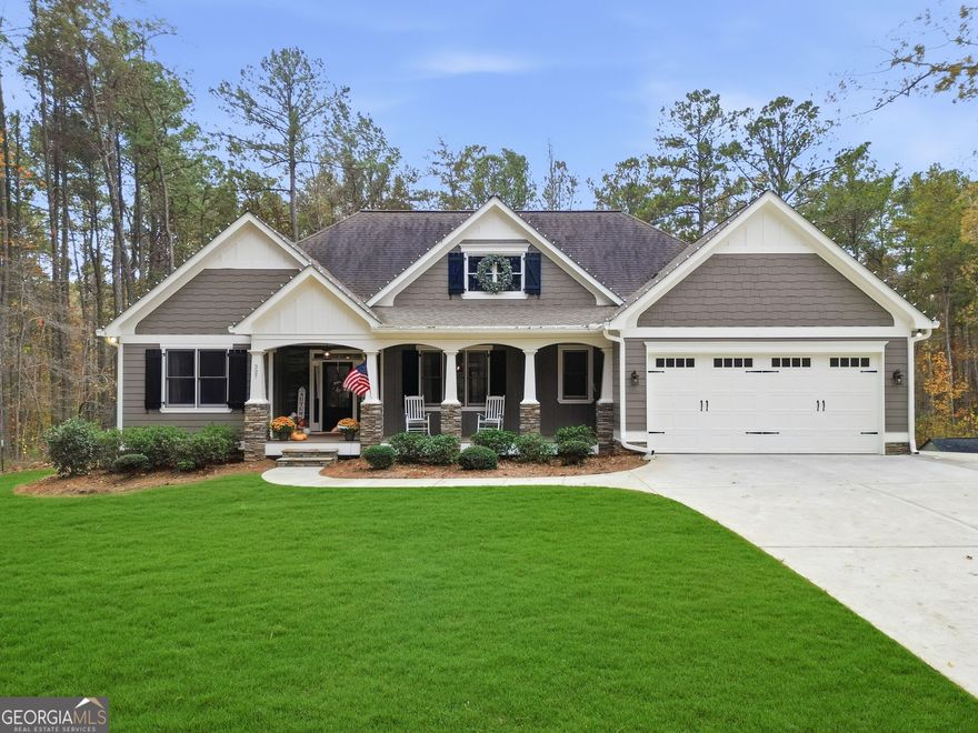 Take a look at this beautiful, custom built ranch in Cherokee County! Not only does this home sit on over an acre, it sits far off the road with a nice, long driveway - the lot is amazing and probably the most private in the neighborhood. It offers a beautiful front and back yard that has been meticulously maintained. This home features an open concept, split bedroom floor plan with the owner's suite + 2 secondary bedrooms on the main level, a large kitchen island and ample cabinet space in the kitchen, a walk-in pantry, a gas cooktop, hardwood floors, two walk-in closets + an additional closet in the owner's suite, a screened-in back porch with an outdoor fireplace - a perfect place to relax, tongue and groove ceilings on the front and back porches, fresh exterior paint (2024) and so much more. The terrace level was finished in 2023 to include a large living room, a full bathroom and 2 additional bedrooms (or an office), plus plenty of unfinished storage space. This home has been extremely well maintained, and it's apparent as soon as you pull up. The location offers easy access to Lake Allatoona, Lake Arrowhead and both I-575 and I-75, sitting right between Canton and Cartersville.