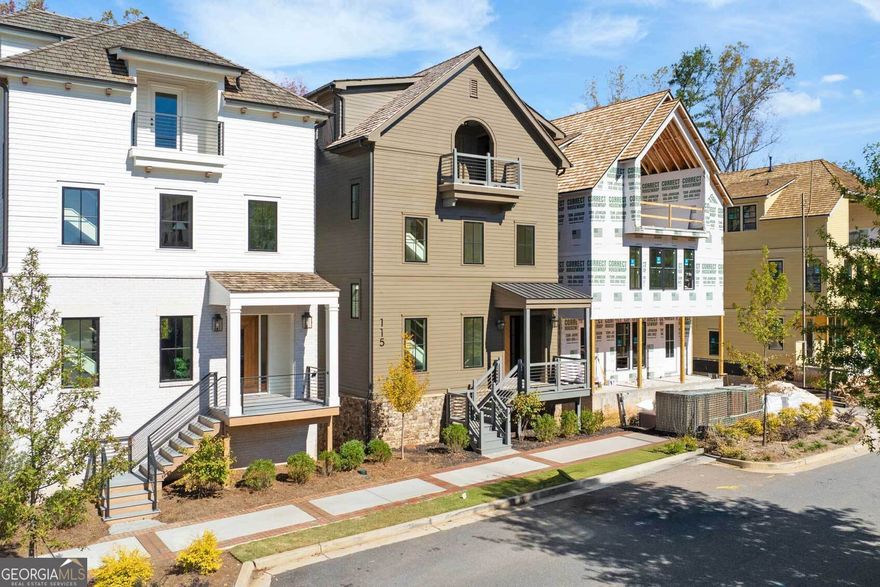 ** READY NOW - NEW CONSTRUCTION IN DOWNTOWN ALPHARETTA **  A+ location with direct Alpha Loop access and easy walking distance to both Historic Downtown and Avalon. This newly designed single-family residence blends timeless architecture with sophisticated modern living - offering multiple covered outdoor spaces, a 3-car garage, and an included elevator serving all levels.  Inside, the heart of the home is the gourmet kitchen - a 3-sided design that surrounds a large center island with seating and abundant cabinetry. Culinary enthusiasts will love the 48" Wolf range, built-in Sub-Zero refrigerator, Cove dishwasher, and under-counter beverage center, all set against quartz countertops and a designer tile backsplash.  The open-concept main level is filled with natural light and anchored by an elegant linear fireplace visible from the kitchen and dining areas. A stunning switchback staircase leads to the upper levels, creating both a design feature and functional flow.  Upstairs, the primary suite is a serene retreat with a spa-inspired bath featuring dual vanities, a freestanding soaking tub, large walk-in shower, and spacious walk-in closet. Step out onto the covered rear terrace with peaceful views of the Alpha Loop - the perfect place to start or end your day. A generous secondary bedroom on this floor includes its own ensuite bath and walk-in closet.  The top level is designed for entertaining and relaxation, with a large bonus room and custom wet bar opening to a spectacular covered rooftop terrace - ideal for lounge seating or even a hot tub, all overlooking the Loop. A guest bedroom with full bath and walk-in closet completes this level.  On the ground floor, enjoy the convenience of a 3-car garage, mudroom/drop zone, elevator access to all floors, and a covered side porch for easy outdoor entry.  Every detail reflects craftsmanship and design excellence - from the stacked-stone foundation and cedar shake roof to the smooth lap siding with minimal reveal.  Ready now for immediate move-in.