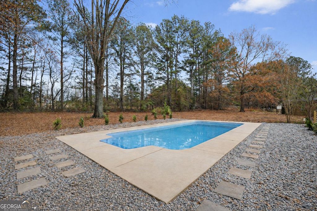 Photo of 12 Clearwater Road, Sharpsburg, GA 30277 (MLS # 10662813)