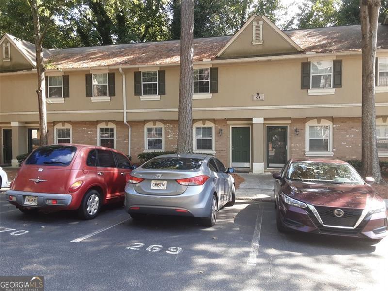 Talk about great location. Access to restaurants, highway 400/285, and MARTA transportation. This recently renovated 2 level condo was just renovated with new floors throughout. Thats right, no carpet! You will love this gated community in an excellent location.