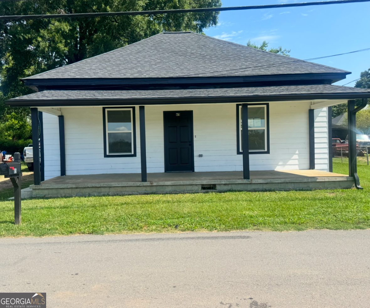Fully renovated and move-in ready, this 3-bedroom, 2-bath home is perfect for first-time buyers or investors. Recent upgrades include a newer roof, HVAC system, water heater, and flooring throughout. The bathrooms have been updated with modern finishes. The home features a functional layout, a covered back porch for relaxing or entertaining, and a level, fenced lot that's great for pets or outdoor activities. Located just half a mile from Downtown Griffin, you're minutes from shopping, dining, schools, and parks. Ask how you can receive up to $500 in lender credit by using one of our preferred lenders. Exclusions may apply. Don't miss this incredible opportunity; schedule your showing today. Professional photos coming soon.