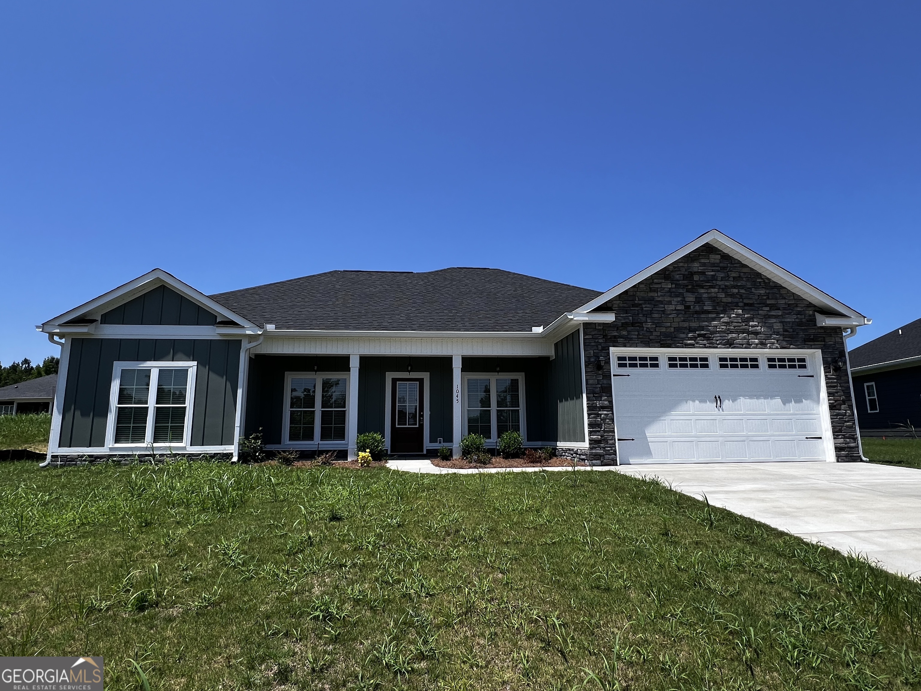Beautiful New Construction in Millbrook Subdivision! Step into luxury and comfort with this stunning 4-bedroom, 2-bath home offering 1,943 sq. ft. of thoughtfully designed living space. From the moment you walk in, you'll love the open floor plan, perfect for both everyday living and entertaining. The spacious living room features a cozy gas log fireplace, while the eat-in kitchen boasts gleaming granite countertops, stainless steel appliances, and plenty of cabinet space. Relax in the owner's suite, complete with a large walk-in closet and a luxurious on-suite bath featuring a garden tub, walk-in shower, and dual sink vanity with granite finishes. Enjoy peaceful mornings or unwind in the evenings on the expansive 25x12 screened-in back porch. Additional highlights include: Tankless water heater, Installed blinds, 6'' Gutters and MORE! High-quality construction with premium finishes throughout! Don't miss your chance to own this new home packed with upgrades!