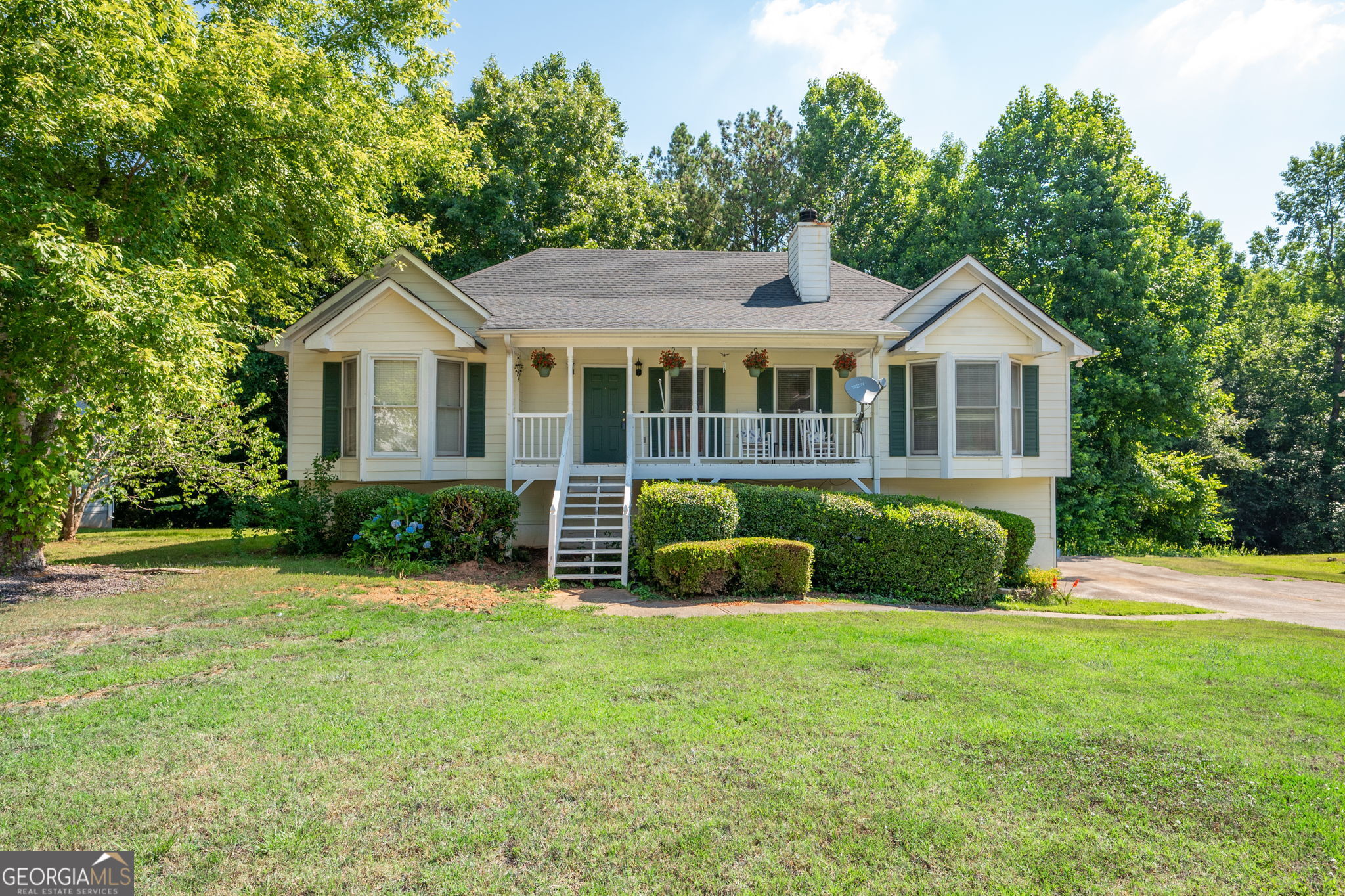 Happy Home in a RAISED RANCH: The home that love built. Welcome to this sought after home in Powder Springs. You will love the space and quietness of this home. Brand new stainless steel appliances, open floor plan with view to dining and kitchen. Basement is partially finished, with large garage space. Sip and see southern front porch for your neighborhood sights.