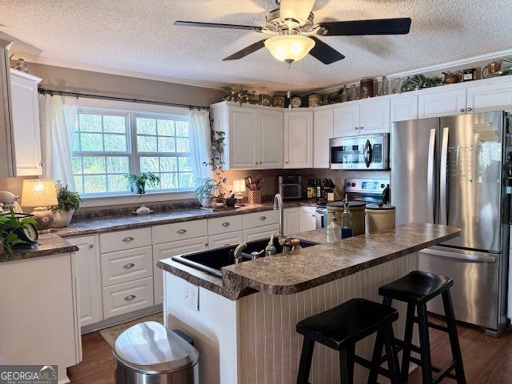 Photo of 968 Saint Mathews Church Road, Metter, GA 30439 (MLS # 10677866)