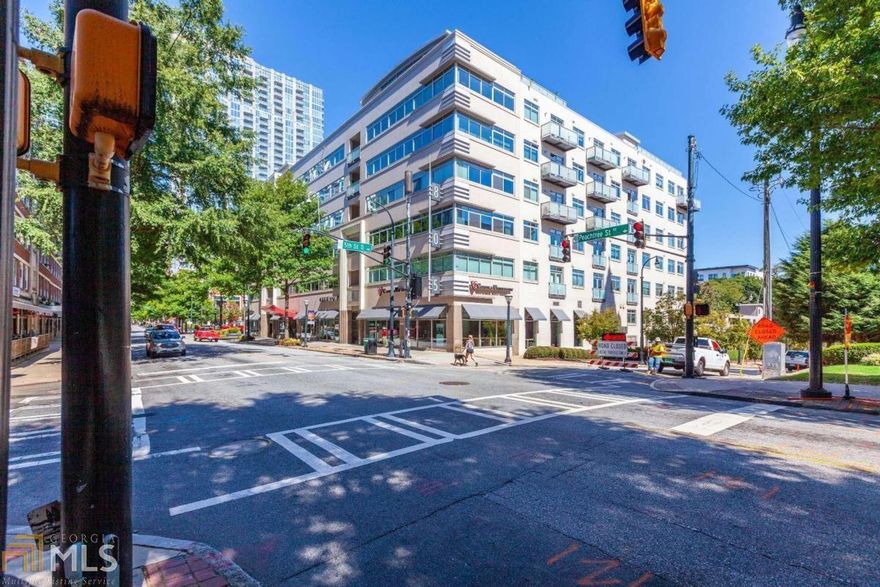 805 Peachtree is located in Midtown Atlanta between 5th and 6th streets, which puts it close to everything from shopping to Michelin star restaurants. The beautiful one-bedroom loft features a renovation with a unique kitchen layout that is the most useful for this size unit. This gourmet kitchen features plenty of storage and counter space. The hall office is great for work-at-home days. The gorgeous bath features bright tile and stone mixtures. This unit also includes 2 parking spaces, which is unique. This unit also comes with a storage space across the hall.
