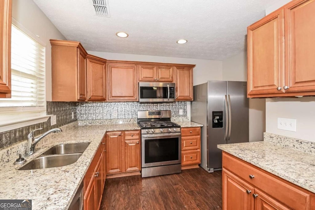 Photo of 234 Carrington Way, Canton, GA 30115 (MLS # 10875158)
