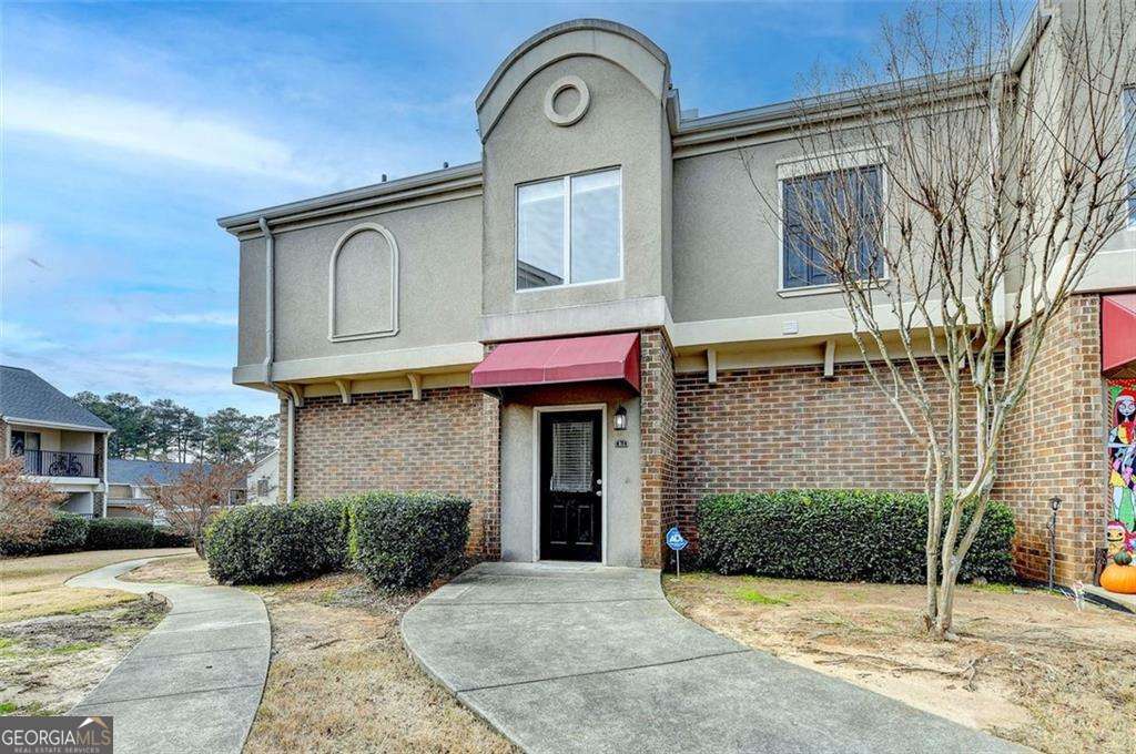 Stunning End Unit Condo with Modern Upgrades and Prime Location! Step into a beautifully renovated space with top-of-the-line finishes and modern aesthetics. Enjoy the convenience of brand-new appliances, making your daily routines a breeze.Benefit from water being included in the HOA fees, simplifying your monthly expenses. Situated in a prime location, this condo offers easy access to major highways and is just minutes away from grocery stores and other amenities.Experience added privacy and natural light with this desirable end unit.