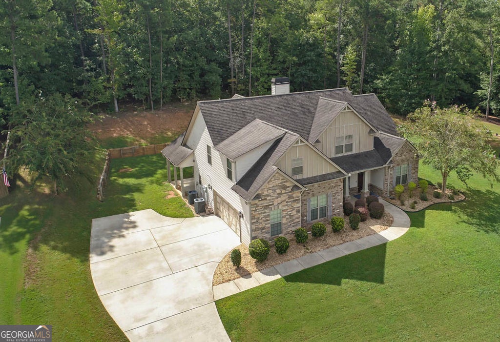 Photo of 308 Cinnamon Bark Pass, Locust Grove, GA 30248 (MLS # 10837771)