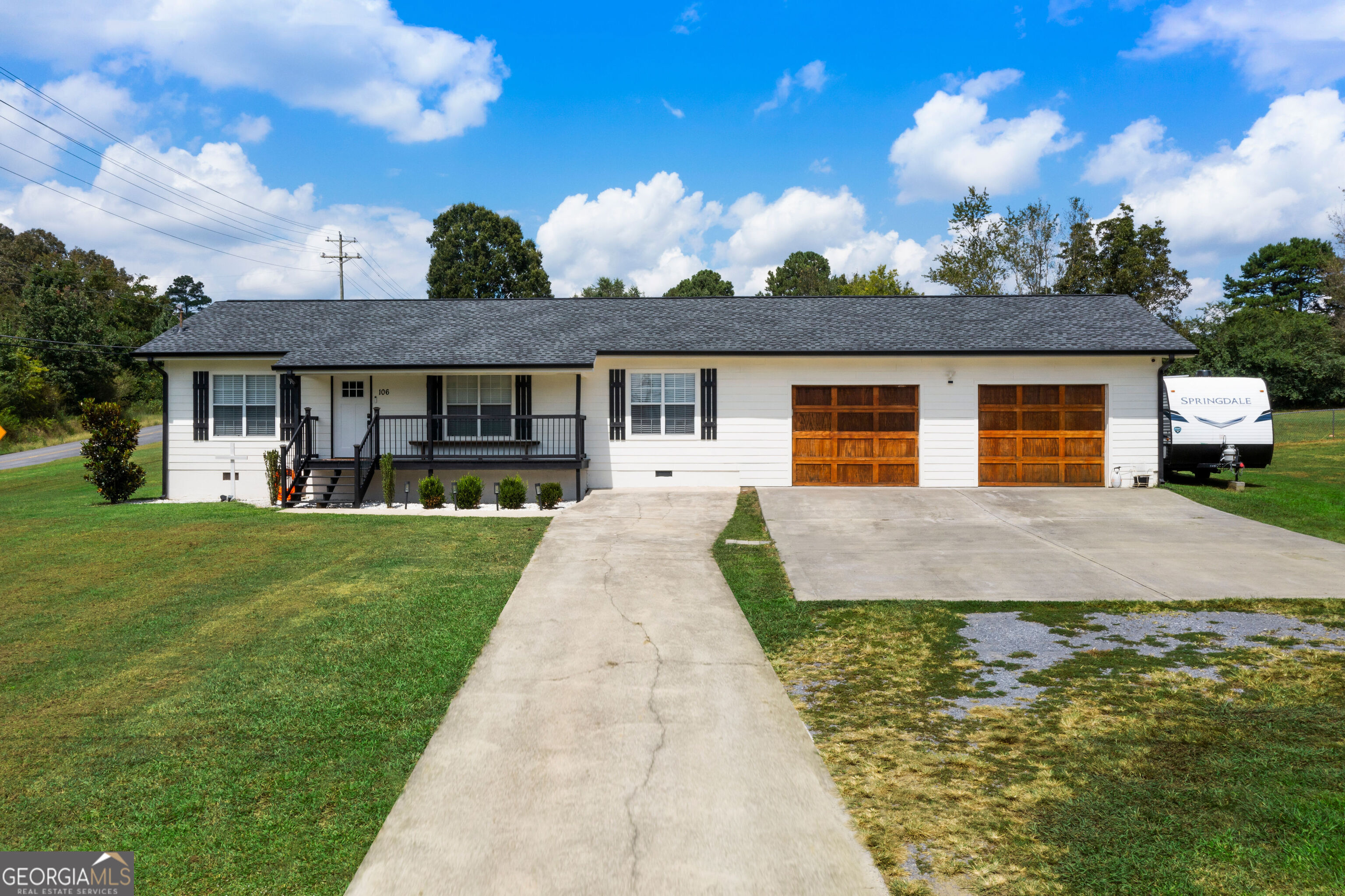 Charming 3-Bedroom Ranch with Bonus Room, Oversized Garage & Outdoor Living Spaces! Welcome to this beautifully maintained 3-bedroom, 2-bath ranch home that perfectly blends comfort, style, and functionality. Situated on a well-landscaped lot with fresh landscaping and a brand new roof, this home is move-in ready and waiting for you! Step inside to discover an inviting floor plan featuring a spacious living area and a bonus/media room-perfect for movie nights, a home office, or a playroom. The kitchen shines with modern touches including a tile backsplash, ample cabinetry, and great flow for everyday living or entertaining. The primary suite offers a peaceful retreat, while two additional bedrooms provide plenty of space for family or guests. Both bathrooms are well-appointed for comfort and convenience. Outdoor living is a breeze with a screened-in back porch, an expanded deck ideal for grilling or relaxing, and a covered front porch that adds charm and curb appeal. The oversized attached garage offers ample space for vehicles, storage, or a workshop, and there's an additional parking pad for guests, RV, or boat parking. This home truly has it all-modern upgrades, flexible living space, and outdoor features to enjoy year-round. Don't miss your chance to own this exceptional ranch home! Schedule your private showing today!