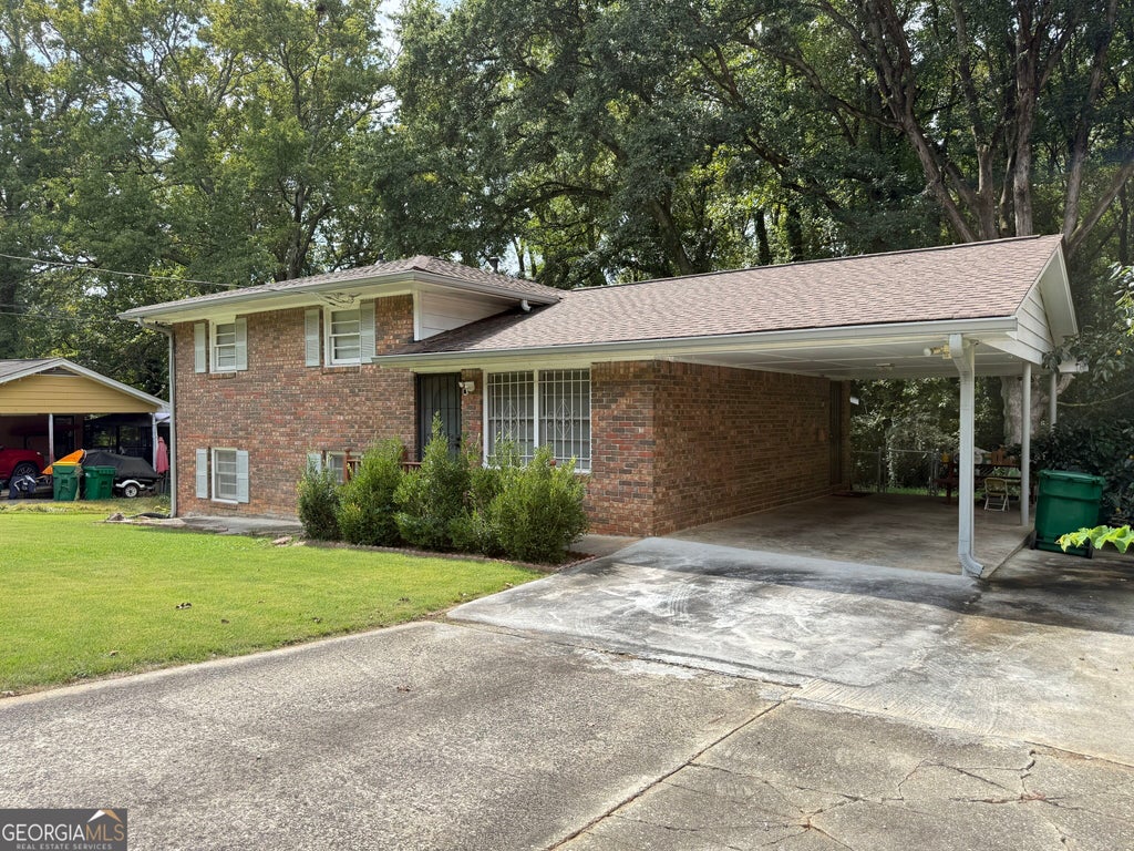 Photo of 5941 Pinecreek Road, Forest Park, GA 30297 (MLS # 10867650)