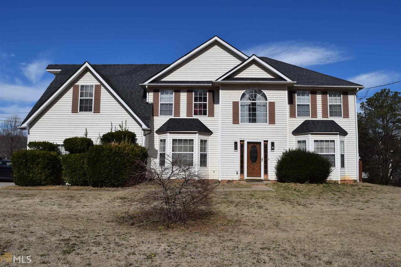 Large 2 story home in Riverview Chase. Home features large foyer. Formal living and dining room. Eat in kitchen. Step down family room with rear access to oversized master. This oversized master bedroom features a sitting room, walk in closets, and en suite bath with separate tub and shower. Generous secondary bathrooms. Full bath on main level and flex room which could be use as an additional bedroom. With a few minor touch ups and updates and this could be your dream home. This one is not going to last. Short sale and property will be sold in as - is condition.
