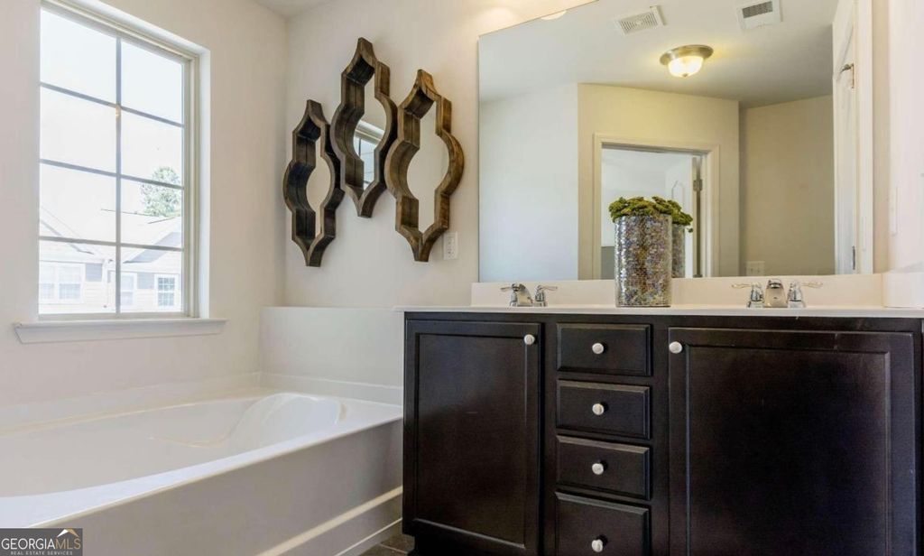 Photo of 5888 Radford Loop, Fairburn, GA 30213 (MLS # 10728719)