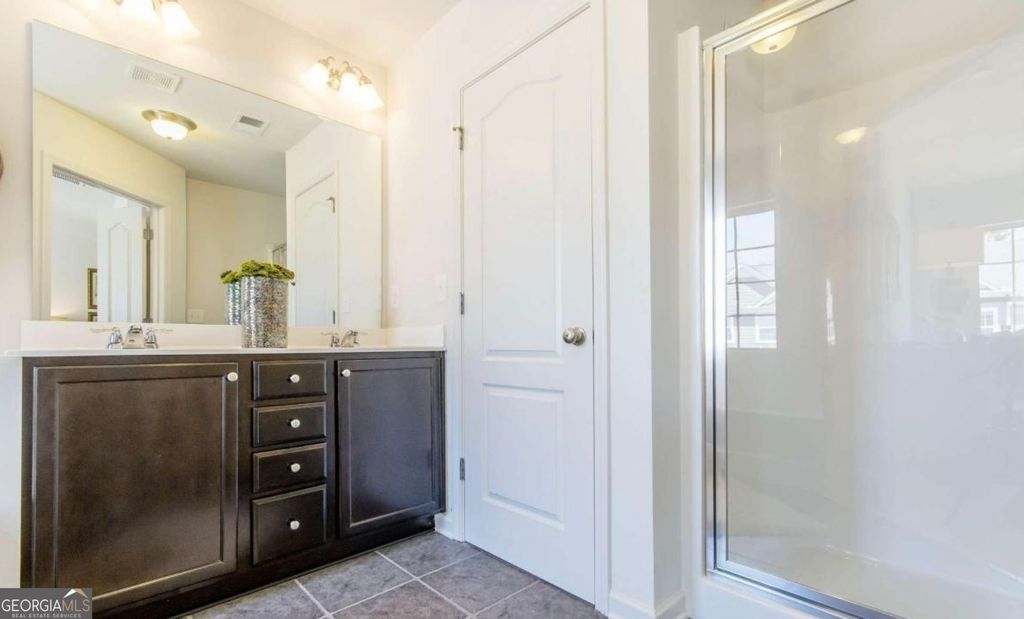 Photo of 5888 Radford Loop, Fairburn, GA 30213 (MLS # 10728719)