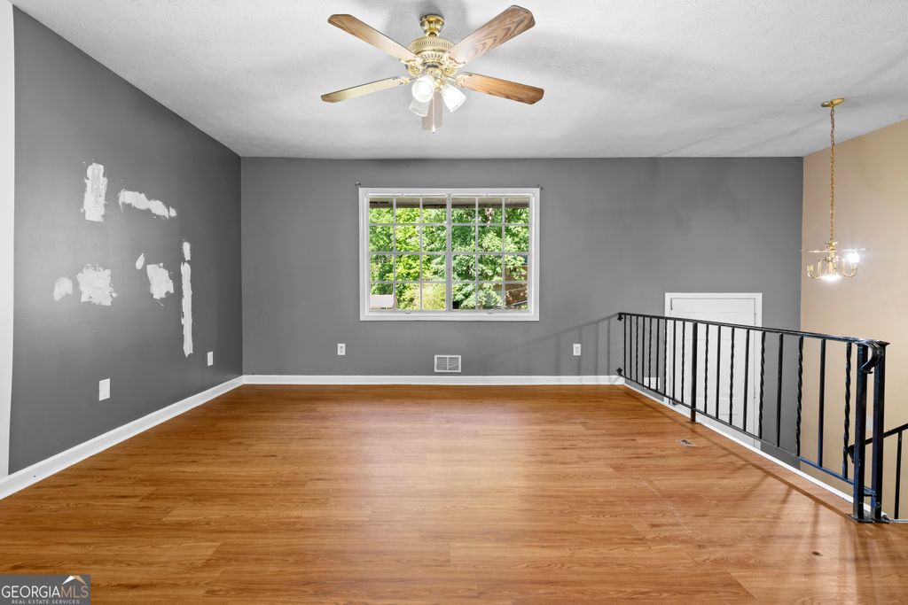 Photo of 1197 Wynbrook Road SW, Marietta, GA 30008 (MLS # 10765690)