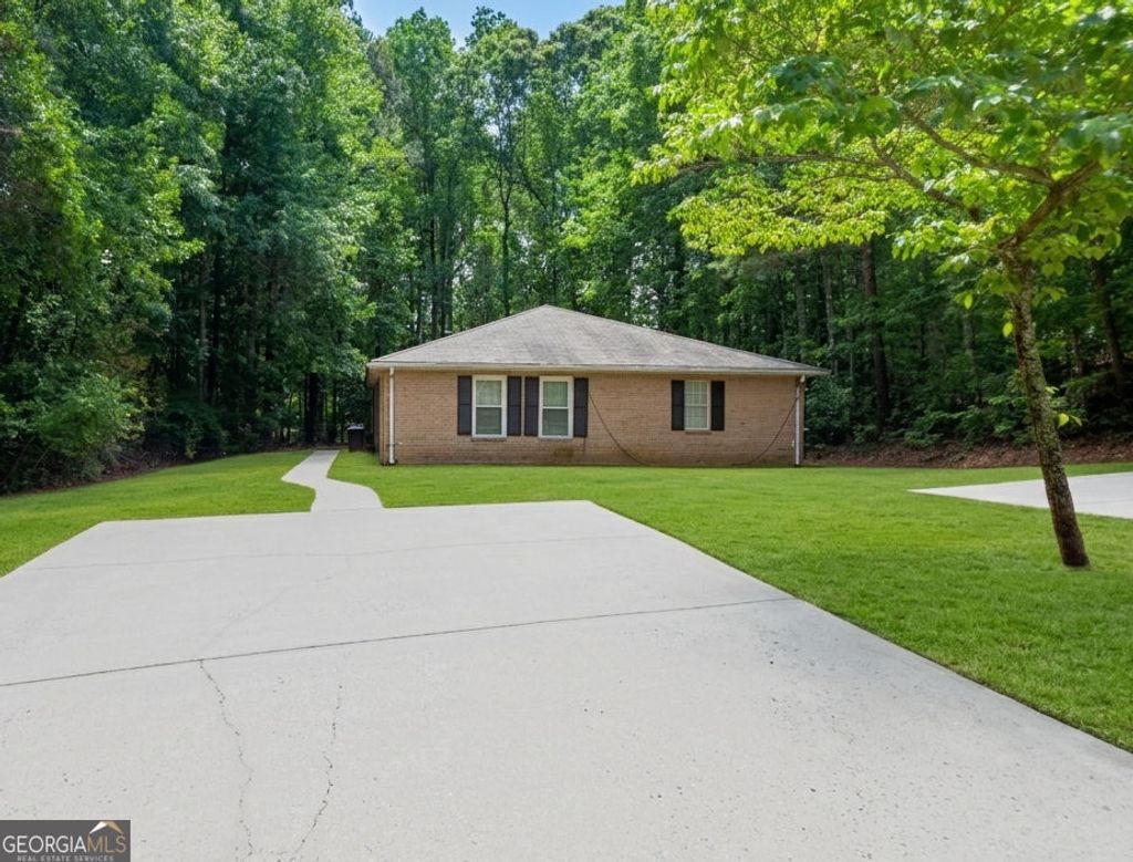 Photo of 714 Jackson Park Lane NW, Suwanee, GA 30024 (MLS # 10754456)