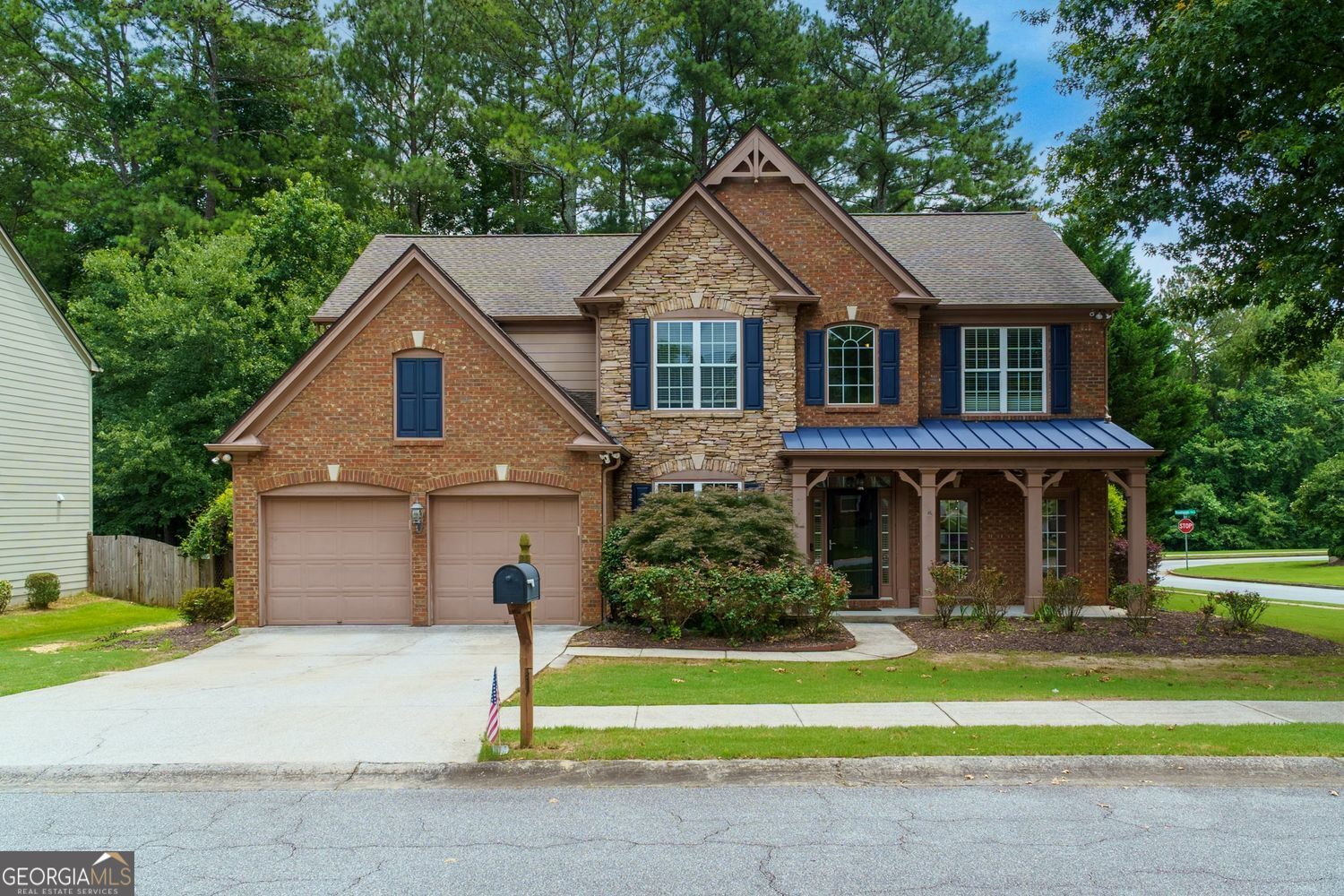 Welcome to Woodstock !! This 5-bedroom, 3-bath home in the highly desirable Woodlands neighborhood is ready for you to move in and make lasting memories. From the moment you step into the two-story foyer, you'll feel the perfect mix of warmth and space. The main floor features a family room with a wall of windows overlooking the private, fenced backyard with oversized covered patio. You'll love this Kitchen !! This is the true heart of the home. The expansive layout includes a huge island, breakfast area, a cozy sitting area with TV nook, and a fireplace. All in the kitchen !! The main level also includes a formal living and dining room offering the perfect solution for a dedicated home office, study, or play area. Enjoy beautiful hardwoods throughout the main level and modern, low-maintenance luxury vinyl upstairs. The oversized primary suite is a peaceful escape with high tray ceilings and a large bathroom with double vanity and plenty of useful counterspace. Three other generous private bedrooms upstairs provide plenty of room for everyone. The Woodlands community is famous for its family activities. This Woodlands tennis and pickleball communities are some of the best in Cherokee County. The neighborhood also includes a large playground area, several covered pavilions, an Olympic sized pool and an adult pool, great walking trails... and the soon to be Little River Park. Check it out- www.woodstockga.gov/news_detail_T15_R222.php Just minutes from fantastic shopping, restaurants, and concerts in Downtown Woodstock. With easy access to Highway 92, you're conveniently close to East Cobb, Roswell, and Alpharetta. There is a reason listings in this community don't last long.