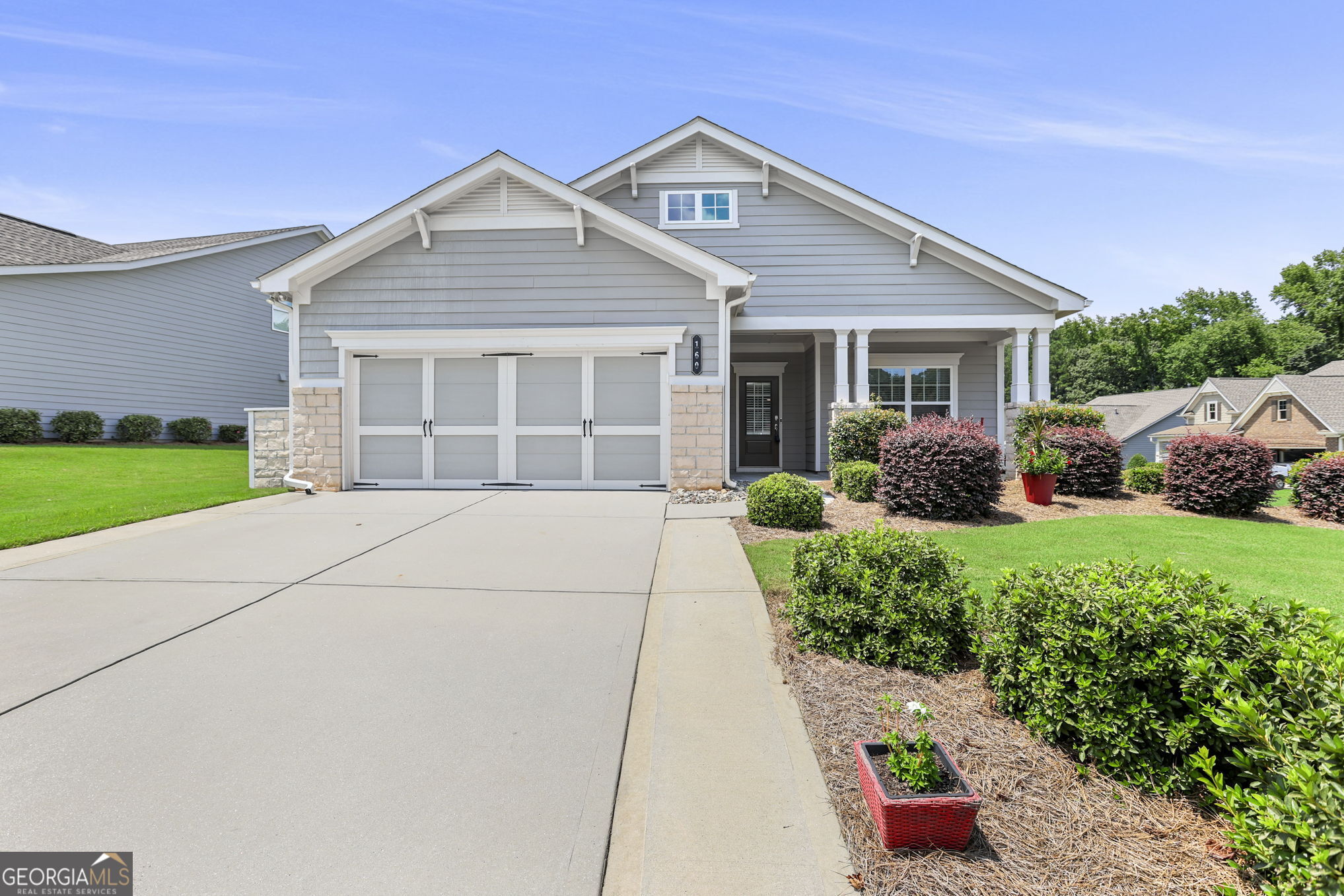 Beautifully maintained home within the Active Adult Community of Timberbrook subdivision. Upgrades throughout! Hardwood floors throughout, 9' ceilings, quartz kitchen countertops, custom cabinetry & storage added in the kitchen, laundry room, butler's pantry, office, and guest closet. The split bedroom floor-plan includes a Master with an expanded closet and a large tiled walk-in shower and separate vanities. The guest bedroom has a full bath to itself. A stunning custom etched glass barn door serves as the entry into the flex room which was converted to an office with custom built-in desks. Other upgraded features found in the home include: smart devices/switches, recessed lighting, 4' garage extension with stairs to attic storage, new hot water recirculator, expanded sides along the driveway, full sprinkler system, double-paned exterior windows, and a unique custom trash blind. Enjoy the year-round back porch with removable vinyl window panes. HOA maintains the yard. This community includes a pool, tennis and pickleball courts, and sidewalks that flow throughout the neighborhood. 5 minutes to shopping/dining and less than 25 miles to the airport. Convenient access to Peachtree City, Newnan, & I-85.