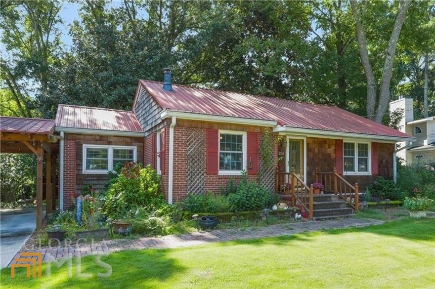 ADORABLE 4 SIDED BRICK COTTAGE/RANCH NEAR DOWNTOWN SMYRNA ON A SPECTACULAR ALMOST ONE-HALF ACRE LOT. NEWER KITCHEN WITH STYLISH SUBWAY TILE BACKSPLASH AND GRANITE COUNTERS.  NEW LVT FLOORING IN KITCHEN AND DEN, REAL HARDWOODS IN ALL OTHER ROOMS.  KITCHEN OPENS DIRECTLY TO THE LIVING ROOM FEATURING A REAL WOOD BURNING STOVE. ADDITIONAL PRECIOUS DEN/TV ROOM OFF THE KITCHEN WITH NEW LVT FLOORING. NEWER LIGHT FIXTURES, UPDATED HVAC, WINDOWS UPGRADED... THIS HOUSE IS REALLY PRECIOUS AND IS MOVE-IN READY. WHOLE HOUSE GENERATOR AND BARN/WORKSHOP ON THE PROPERTY.  AMAZING LOT!