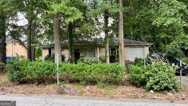 Ranch style home with spacious great room! Includes large kitchen, cozy bedrooms, and a deck that overlooks the backyard. This charming single-family home is nestled in a vibrant and welcoming neighborhood, offering the perfect blend of city convenience and suburban charm. Easy access to nearby Wilson Mill Park, convenient to shops, restaurants, the airport, and major highways for convenient commuting. Experience the perfect blend of style, comfort, and location! Schedule a viewing today and make this gem your own!