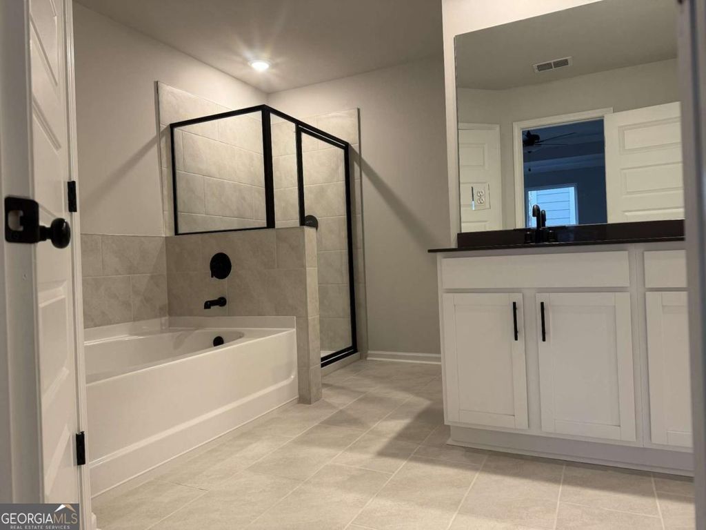 Photo of 327 Yukon Drive #65, Conyers, GA 30094 (MLS # 10650683)