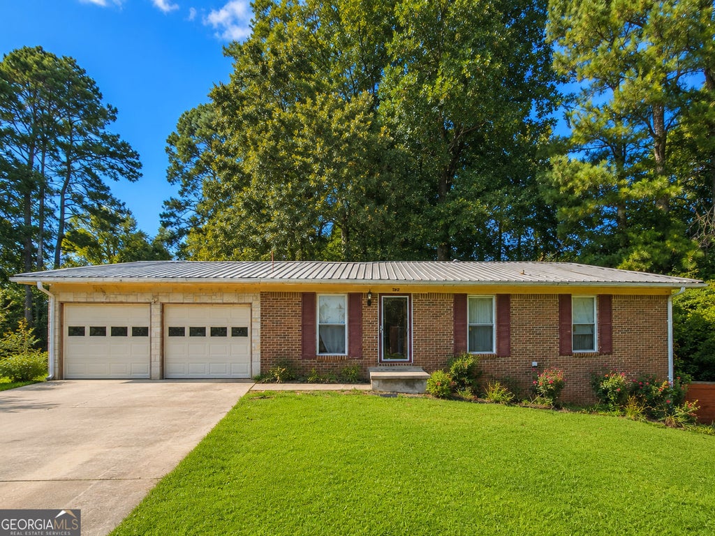 Photo of 635 Winchester Lane NW, Norcross, GA 30071 (MLS # 10828752)