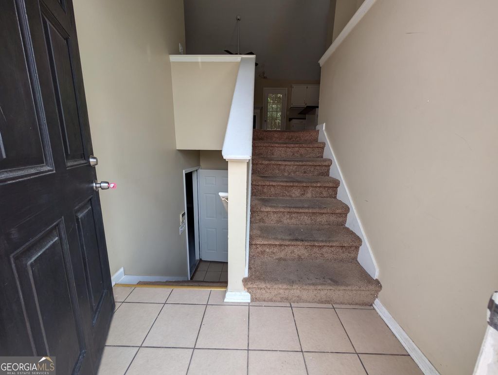 Photo of 1103 Hidden Brook Trail, Atlanta, GA 30349 (MLS # 10652772)