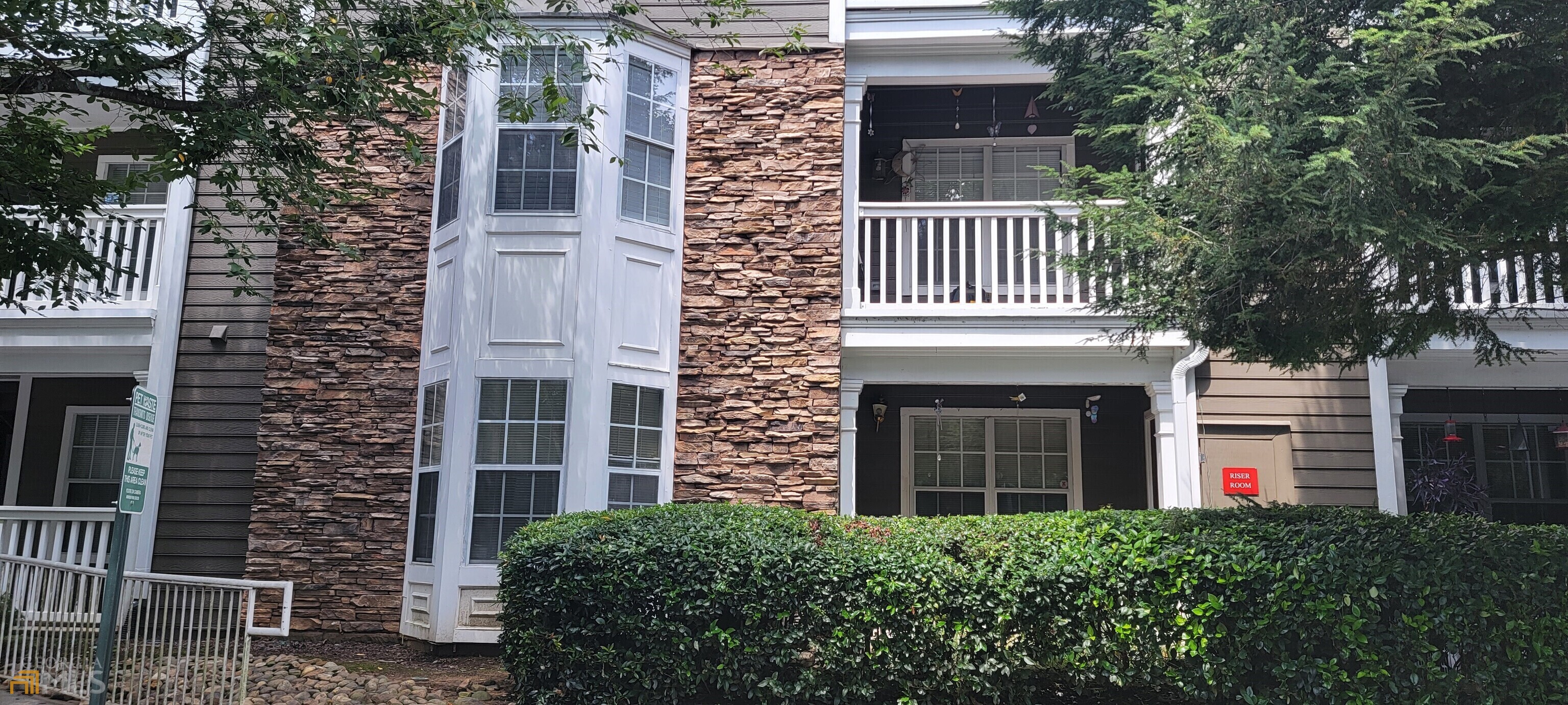 Beautiful, renovated condo in Tucker, less than 2 miles off 85! The condo is on the second floor and has a view of Pleasantdale road. Wonderful location, close to 85, 285, and plenty of shopping places. Walmart is across the street and has a Marta bus stop on the property. The condo has been renovated and freshly painted. The home has sophisticated designer points, such as a stone wall boasting the kitchen, a barn door for the laundry room, and soft grey color with new doors. The kitchen has stone on the countertops, a backsplash, and a breakfast aisle. Two rooms on opposite sides have their bathroom and huge walking closets. Wood floors in the living/dinner and kitchen areas, and carpet in both bedrooms. The balcony also has a convenient closet. The air conditioner was changed in 2017. The subdivision is gated and has a pool.
