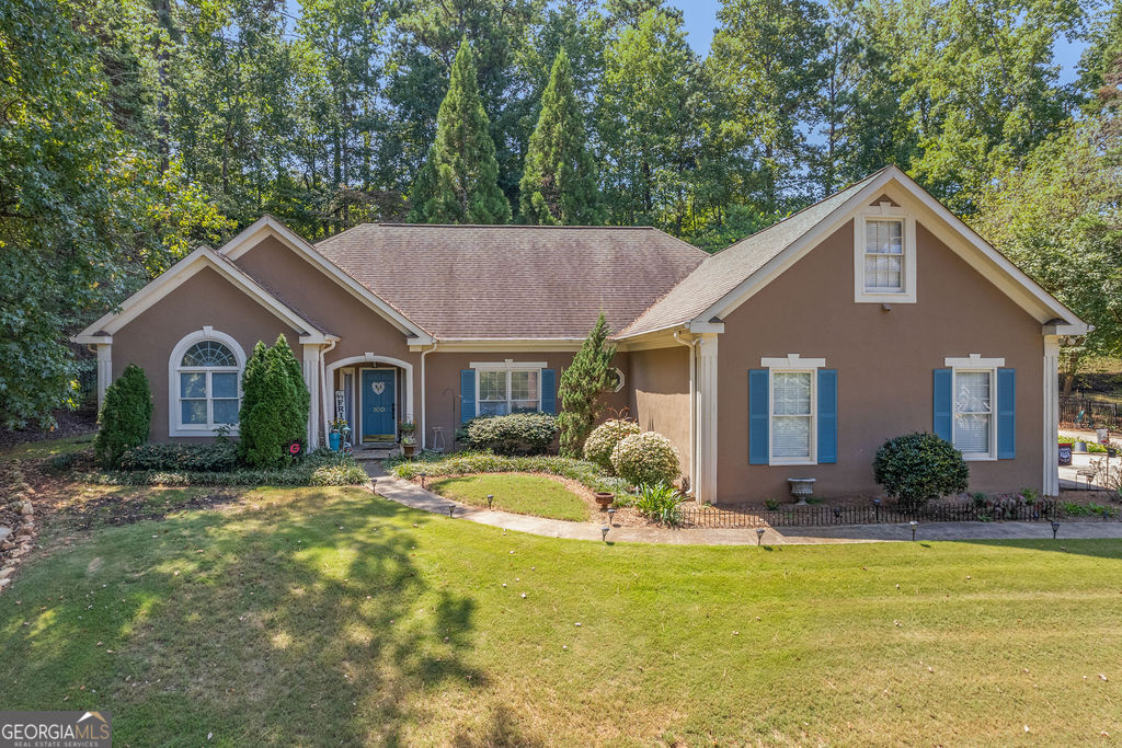 What isn't there to love about this home! Beautifully situated overlooking the Lake at Lake Redwine. One of Newnan's most desired neighborhoods. As soon as you drive up, you will feel at home! Walking into this home you will find an oversized dining room that is open to the very spacious living room and entertaining kitchen and breakfast room. This kitchen has been fully updated and renovated from top to bottom with cabinets galore! Off the kitchen leads you to an all seasons sunroom which adds for additional living space. The owners suite is tucked away on it's own which is perfect for privacy. The owner's spa like bath has also been totally remodeled with double vanities, soaking tub, and walk-in tiled shower. Not one detail has been missed! The opposite side of the home leads you to a generous sized mud room, walk-in pantry, and powder room, again this area of the home has also been totally renovated and updated. You will also find 2 guest bedrooms and a guest bath room. Off the sunroom you will find an entertaining covered back porch with an outdoor firelace. Interior special features list this home was totally renovated in 2019...new paint throughout, flooring (carpet and hardwoods) kitchen, 3 baths, mudroom, Hot water heater is brand new, septic has been recently pumped and inspected. The exterior features a lovely fully landscaped fenced in yard, the perfect location for a pool or detached garage, sunroom was added along with the covered back porch. This is a home that you do not want to pass up!