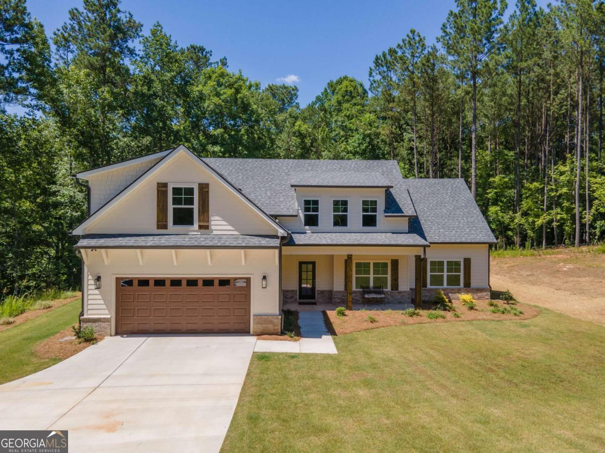 Welcome Home!! Are you looking for a new construction home on the Lake? Come check out this new construction (Prospect Point Plan) right on West Point Lake! In the highly sought after Retreat on West Point Lake Subdivision! Personal boat slip comes with the home! The community offers high end covered boat docks for the residence! Just a short golf cart ride to get to them! Open floor plan with master on main, great for entertaining and lake living. Split bedroom plan with 5 bedrooms, Gourmet kitchen features custom cabinets, granite & Stainless steel appliances! It also has an island overlooking large living room and Covered back porch. Private office space right off the living room! Master suite and two additional bedrooms & bath on main plus two bedrooms & bath upstairs. Lots of storage. Oversized front and back covered porches, perfect for entertaining on the weekends or year round living. This is a private Cul-de-sac lot! The Retreat is an upscale & private lake home community that has endless amenities with gated entrances that you just have to see! Walking & Hiking trails look like they belong in story books! Closing Cost incentives are being offered at this time as well and a FREE golf cart! Call the listing agent for additional info on lots, plans, and features of Retreat!