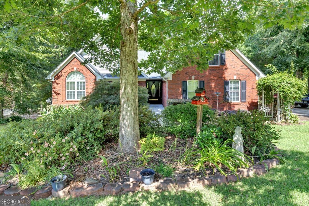 Photo of 40 Woodcrest Avenue, Covington, GA 30016 (MLS # 10841300)
