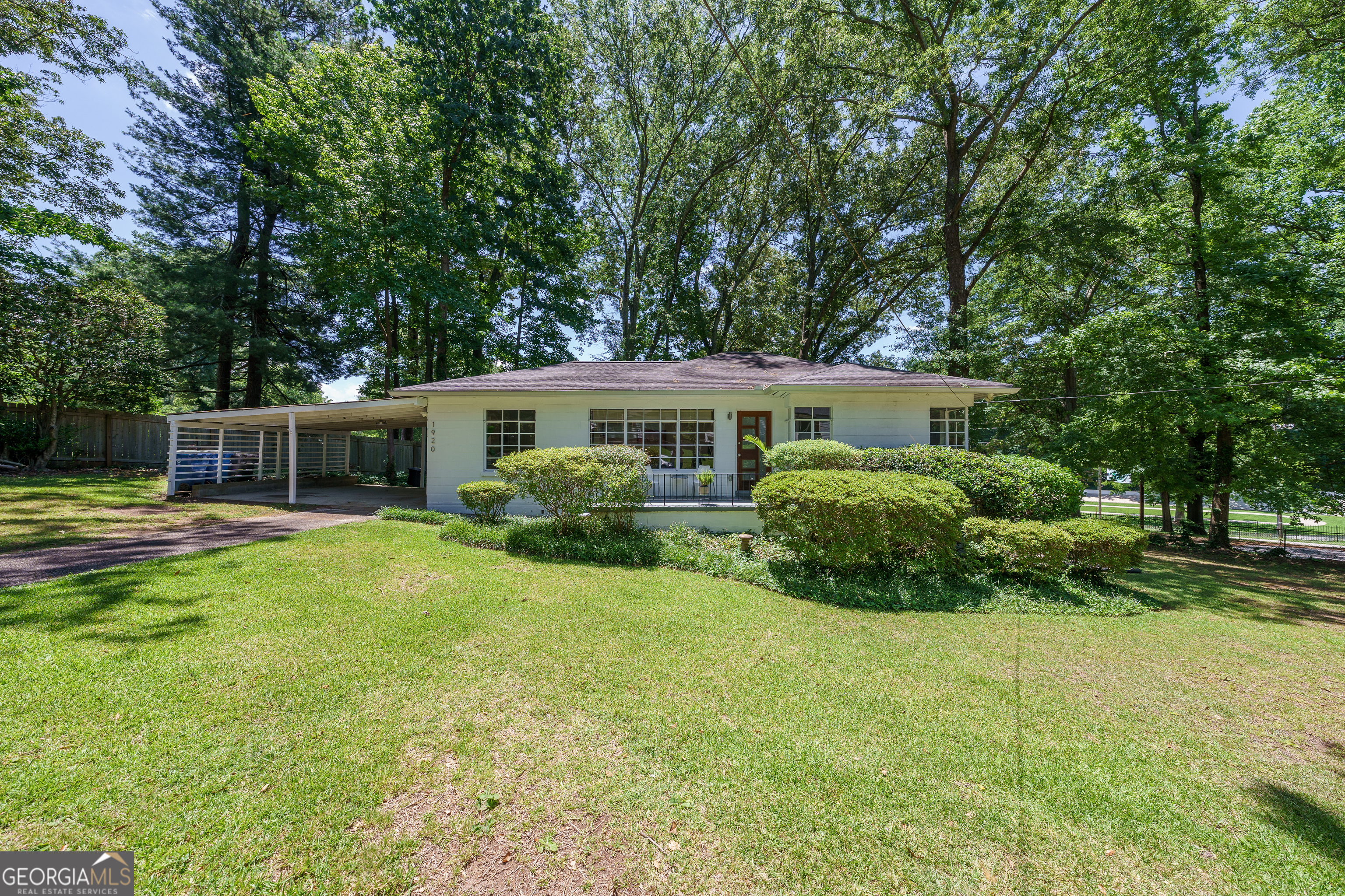 This is a family emergency sale and the sellers are highly motivated. Everything in the home conveys-furniture, kitchenware, bedding, and decor-making it completely move-in ready or an instant Airbnb opportunity. This charming and well-maintained Mid-Century Ranch features 2 spacious bedrooms, a versatile 3rd flex room, and a light-filled bathroom. The bright living room and well-appointed kitchen are ideal for relaxing or entertaining. Enjoy the screened-in covered porch and a large, serene yard on a corner lot with potential for an additional dwelling unit (ADU). Located in a desirable East Point neighborhood, just 3.1 miles from Hartsfield-Jackson Airport, with easy access to local parks, schools, and amenities. Don't miss this rare opportunity-check out the 3D tour and schedule your showing today!
