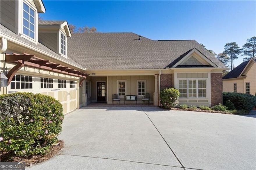 A Rare Opportunity in Highly Sought-After Ballantrae at Creekstone!  Discover a rare chance to own one of the most desirable homes in Ballantrae at Creekstone, a gated, low-maintenance community where luxury living meets effortless convenience. The HOA maintains the exterior, allowing you to enjoy a lock-and-leave lifestyle without sacrificing comfort or elegance. Perfectly positioned for privacy, this residence is one of only six homes with a terrace level, and among the few offering serene wooded views from both the upper covered maintenance free trex deck and the lower covered patio. Tranquility meets a sense of community-the best of both worlds!  Step inside to a beautifully designed open concept floor plan, ideal for both everyday living and effortless entertaining. Thoughtful craftsmanship and timeless finishes elevate every room. The heart of the home is the chef-inspired kitchen, featuring an oversized island that flows seamlessly into the fireside great room. A sun-filled breakfast room opens to the expansive covered porch and sunning deck - perfect for coffee at sunrise, dining outdoors, or unwinding with nature as your backdrop. The main-level primary suite offers the luxury and convenience of one-level living and includes private deck access, creating a spa-like sanctuary for quiet mornings or evening sunsets. Two additional bedrooms and a full bath are thoughtfully placed on the opposite side of the main level for privacy. A welcoming foyer includes a versatile office nook ideal for remote work, reading, or hobbies. The terrace level is an entertainer's dream, complete with a spacious family room centered around a striking stone fireplace, a bar, game room, two generous bedrooms, a shared bath, and three storage areas. Whether hosting game night, holiday gatherings, or weekend guests, this level offers comfort and versatility for everyone to enjoy.    The spacious two garage provides ample parking and space, as well as permanent stairs to expandable attic space.  Residents of Ballantrae at Creekstone enjoy access to a charming clubhouse with a fitness center, library, and outdoor putting green-enhancing a lifestyle centered on leisure and connection. And with a prime South Forsyth location near Halcyon, The Collection, the Greenway, and GA-400, you're minutes from exceptional dining, shopping, hospitals, and recreation.