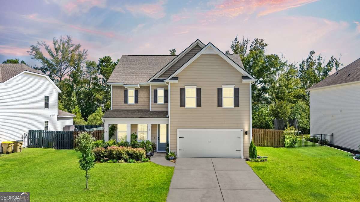 Offering a rare VA Assumable loan with a 2.65% Interest Rate!! Now is your chance to lock in a better than new, move in ready home with unbeatable low payments. This 4 bed + front flex/office room 2.5 Bath 2 Garage home is situated on the premiere golf course of sought after Richmond Hill, with a premium lot backing up to treeline and by the cul-de-sac. Enjoy your mornings with a cup of coffee on the front porch w/ established landscaping for privacy. Enter through the 8ft grand entry door to 9ft tall ceilings, seamlessly moving to the open concept kitchen with an over 8ft long island making it perfect for any chef & host. Enjoy thought out upgrades from new deep kitchen appliance storage drawers, upgraded floors, fenced, architectural shingle roof 23, to custom safe closet & cabinets in laundry room. Work your way to the elongated owners suite with massive bathroom equipped with soaking tub and separate walk in shower. And want to enjoy working on your garage but cant stand the Georgia heat? The lifestyle garage custom sliding screen gives the best of both worlds. Near the community pool, playground, pavilion, & more. Conveniently located by Ft.Stewart/HAAF, Hyundai Plant, SCAD, Gulfstream. *Twilight photo virtually enhanced.*