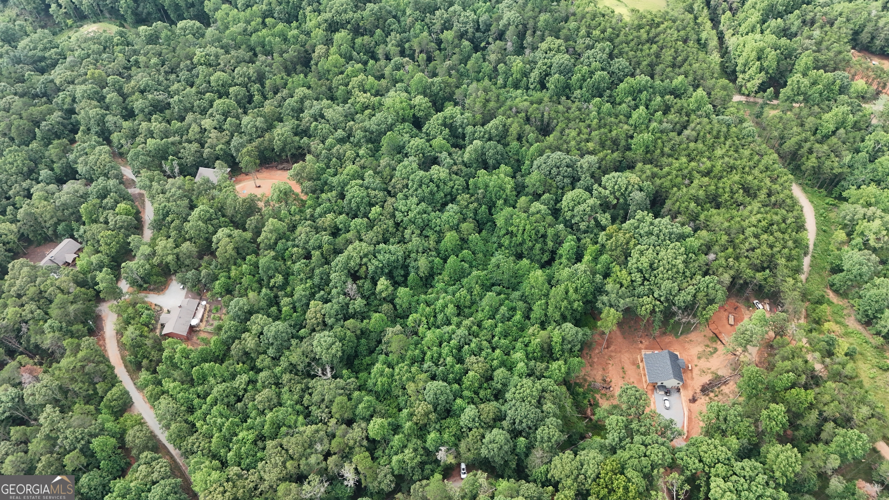 Ready to Build in the North Georgia Mountains! Bring your dream home plans to life on this beautiful 3+ acre lot in a highly desirable North Georgia location! This property offers a clean slate to design the home you've always envisioned, with a completed soil test already in place to jumpstart your building process. Enjoy peace and privacy without HOA fees! Convenient to local schools, shopping, and restaurants, this lot offers both seclusion and accessibility. Whether you're looking to build a full-time residence or a weekend getaway, this property is the perfect foundation for your future.