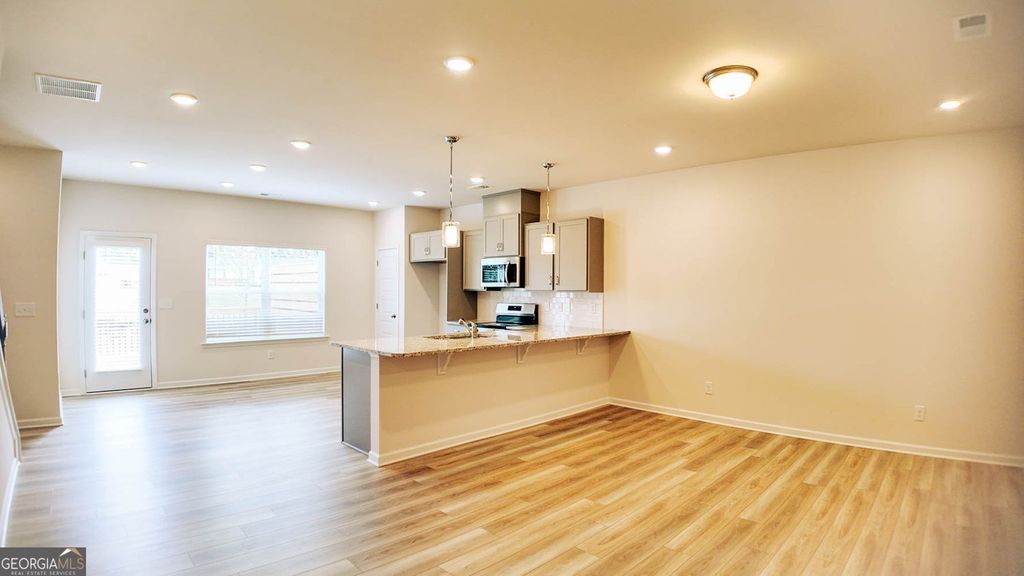 Photo of 102 Jacobs Farm Lane #40, Lawrenceville, GA 30045 (MLS # 10657367)