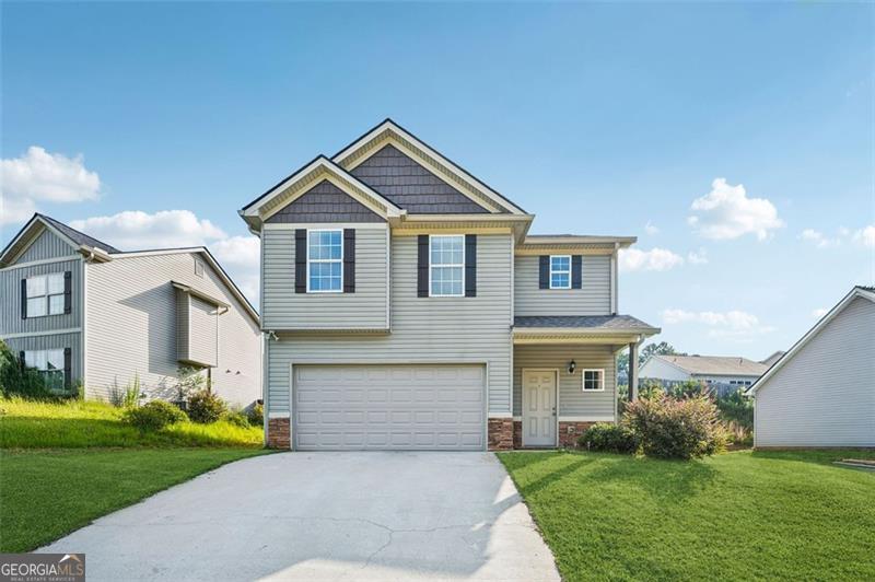 Welcome to your dream home in the peaceful Highland Pointe subdivision, where modern living meets the charm of country life. Built in 2020, this move-in ready home offers easy access to Gainesville, Cornelia, and North Georgia's scenic routes, thanks to its convenient location just half a mile from US-23. Enjoy the serenity of country living with no HOA restrictions, while staying close to everyday essentials. This beautiful property features three bedrooms and two and a half baths, with an open-concept living area highlighted by impressive 10-foot ceilings. The main level offers stylish vinyl flooring, while the staircase and second floor are finished with cozy carpet. The oversized master suite includes a walk-in closet and a luxurious master bath complete with a fully tiled shower and double vanity. Throughout the home, you'll find elegant granite countertops and the year-round comfort of dual-zone climate control. A covered back patio provides the perfect spot to relax, while the attached two-car garage adds convenience and functionality. Even better, this home is located in a USDA-approved area, so you could purchase it with 0% down payment. Work with our preferred lender and you'll also receive 1% towards your closing costs, plus enjoy peace of mind knowing your purchase includes a 1-year home warranty for added protection. Whether you're seeking a peaceful retreat or a place to grow, this home offers the perfect balance of comfort, style, and location. Schedule your private showing today and experience the lifestyle you deserve!