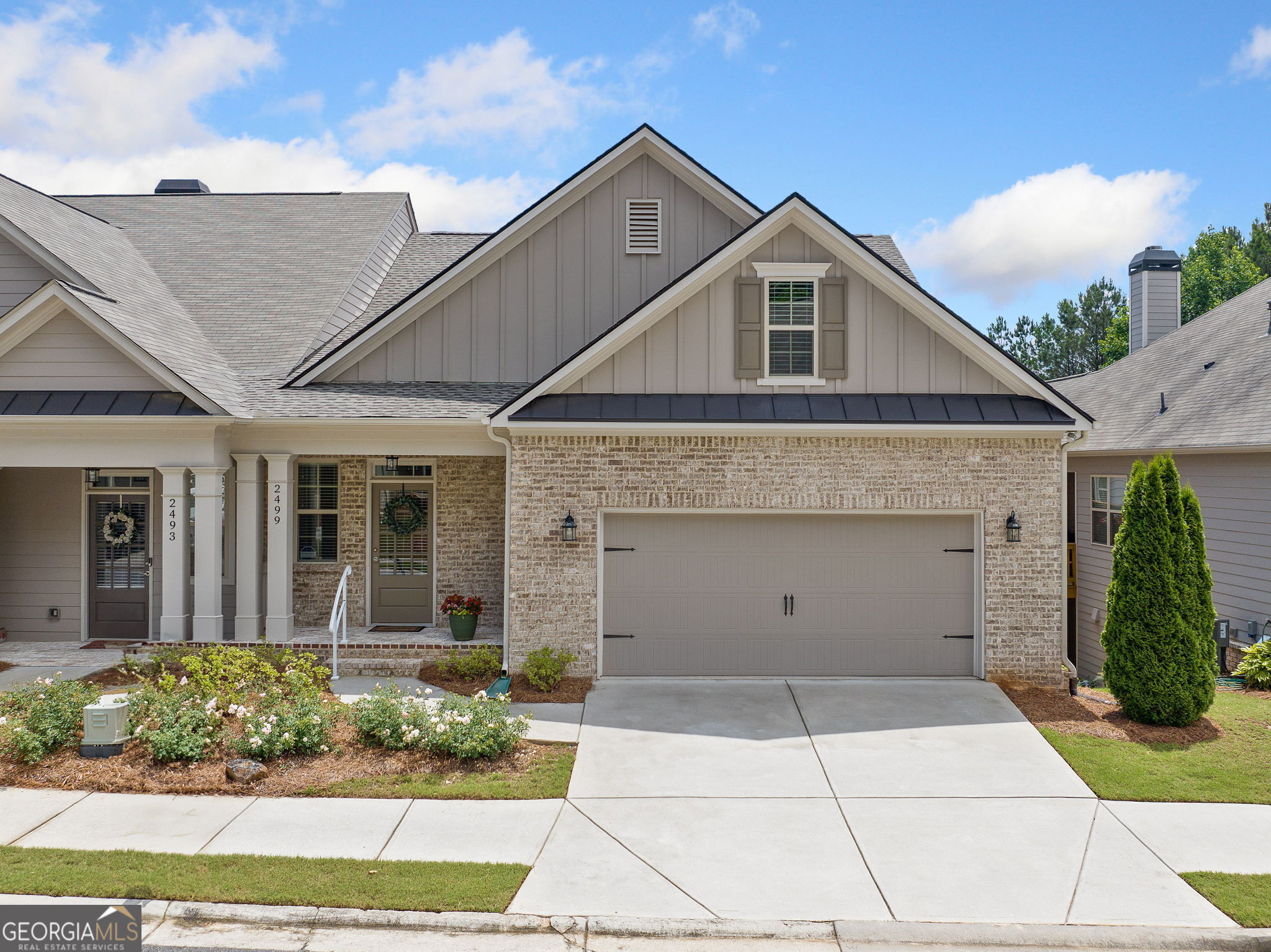 Welcome to this stunning home in Barrett Preserve in West Cobb! Perfectly situated in a sought-after location, this light and bright residence features a spacious open floor plan ideal for comfortable living. The large great room is a true centerpiece, showcasing a beautiful marble fireplace and seamless flow into the gourmet kitchen-a chef's dream with quartz countertops, tiled backsplash, abundant white cabinetry, stainless steel appliances, and a massive island with breakfast bar seating. The spacious primary suite is conveniently located on the main level and offers a luxurious en suite bath complete with dual vanities, a walk-in shower, and a generous walk-in closet. Also on the main level, you'll find a dining room, a laundry room and a half bath for guests. The finished terrace level provides versatile living space, including a large second family room, two oversized secondary bedrooms with a shared Jack and Jill bath, abundant storage, and a private patio overlooking the beautifully landscaped backyardCoperfect for entertaining or quiet relaxation.This home features a fresh, neutral color palette and truly shows like a new home. Roof less than a year old. It's move-in ready and available for a quick close. Refrigerator, washer, and dryer remain! Don't miss your opportunity to own this exceptional home in Barrett Preserve! Enjoy the Community's Covered Pavilion with large double-sided Stone fireplace and 2 sitting areas to gather with friends and neighbors. Barrett Preserve is a 55+ Active Adult Community with 20% of homes qualifying for any Age Ownership.