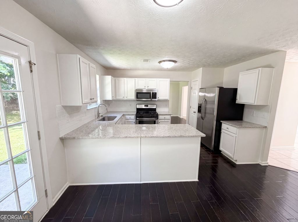 Photo of 3582 Coveside Court, Loganville, GA 30052 (MLS # 10793574)