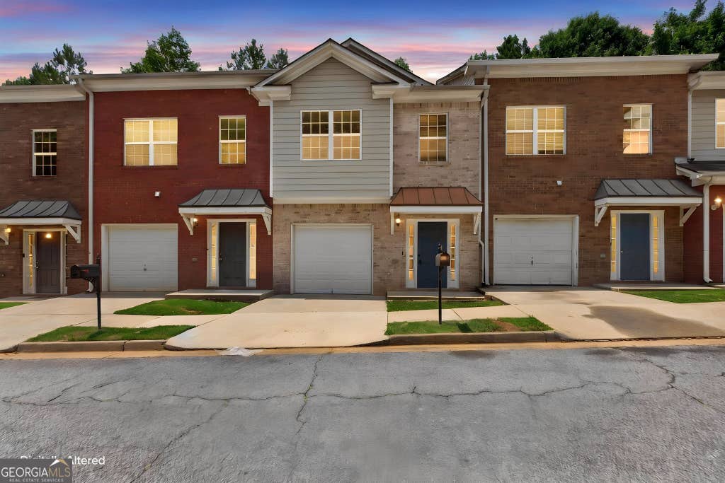 Photo of 5019 Lower Elm Street, South Fulton, GA 30349 (MLS # 10793811)