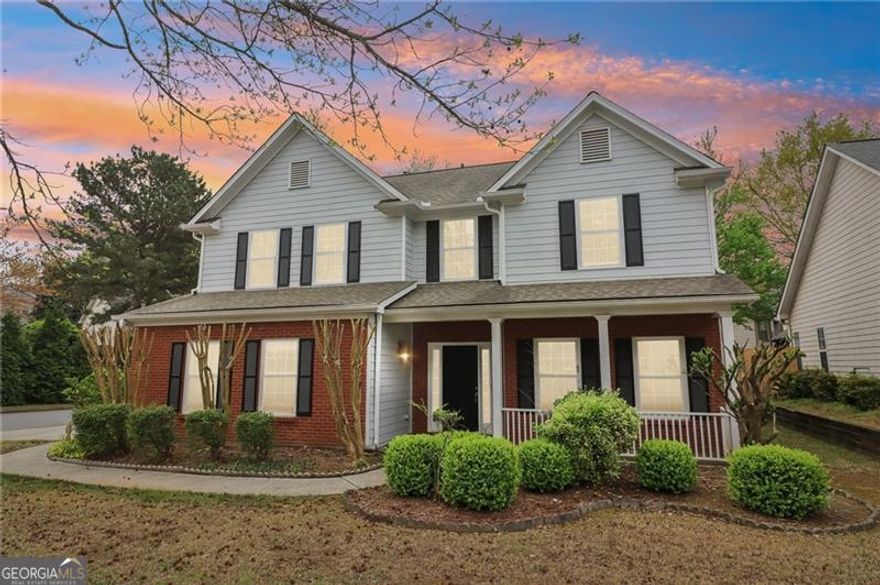 Ideal Family Home Opportunity in Sought-After Johns Creek! Nestled in the heart of the top-rated Chattahoochee High School district, this spacious 4-bedroom, 2.5-bath home sits on a desirable corner lot-offering both charm and functionality for families and investors alike. From the moment you arrive, the Southern-style front porch and beautifully landscaped yard set the tone for warmth and curb appeal. Inside, the versatile layout is designed for both everyday living and entertaining. The living room features durable tiled flooring, seamlessly flowing into the cozy family room with a built-in fireplace-a perfect gathering space. The open-concept kitchen offers generous counter space, ideal for hosting guests or preparing family meals. Upstairs, the spacious primary suite boasts a spa-like ensuite bathroom with dual vanities, a soaking tub, and modern finishes. Three additional bedrooms provide ample space for family, guests, or home offices-all filled with natural light and generous storage. Step outside to the fenced backyard and patio, offering a private retreat for outdoor play, pets, or weekend barbecues. Whether you're looking for a forever home in a prime location or a turnkey rental in one of the area's best school zones, this property delivers on both lifestyle and investment potential. Don't miss this opportunity-schedule a showing today!