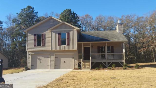 Nice home on a large fenced-in rear area. The fourth bedroom on the lower level has a full bath and an additional separate door entry. Custom features, spacious lot, and a must-see.