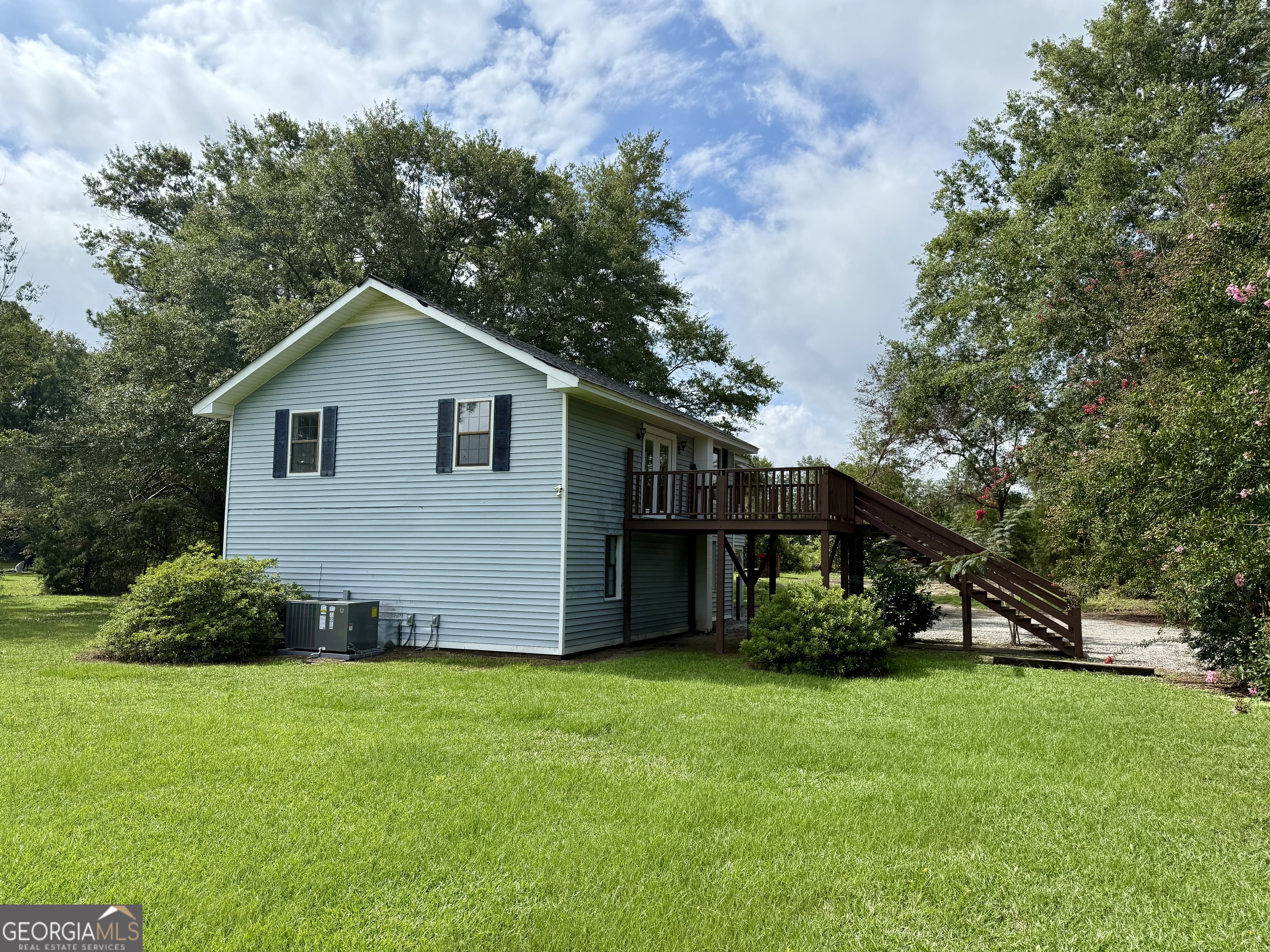 Country living close to schools and convenient to Columbia County right down the road. Enjoy this 2 story 2192 square foot home on almost an acre, featuring all 3 bedrooms on 1 level. Spread out in the large living room right next to the kitchen and dining room, all on the lower level! 2 additional rooms provide for an office or playroom. One bedroom and bathroom have interior log panels that fell like log cabin living! Enjoy a screen porch, sun deck, or several sections of yard areas to play or work. Make your appointment today! Unsure of the ''year built''. Tax assessor does not list it.