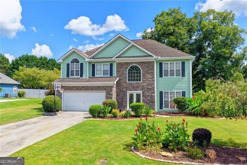 Photo of 398 Beech Hollow Trail, Loganville, GA 30052 (MLS # 10822929)