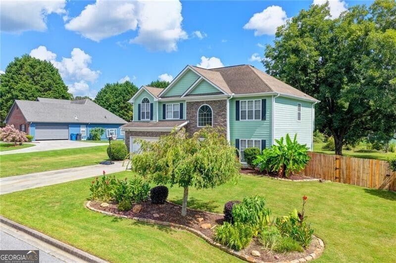Photo of 398 Beech Hollow Trail, Loganville, GA 30052 (MLS # 10822929)