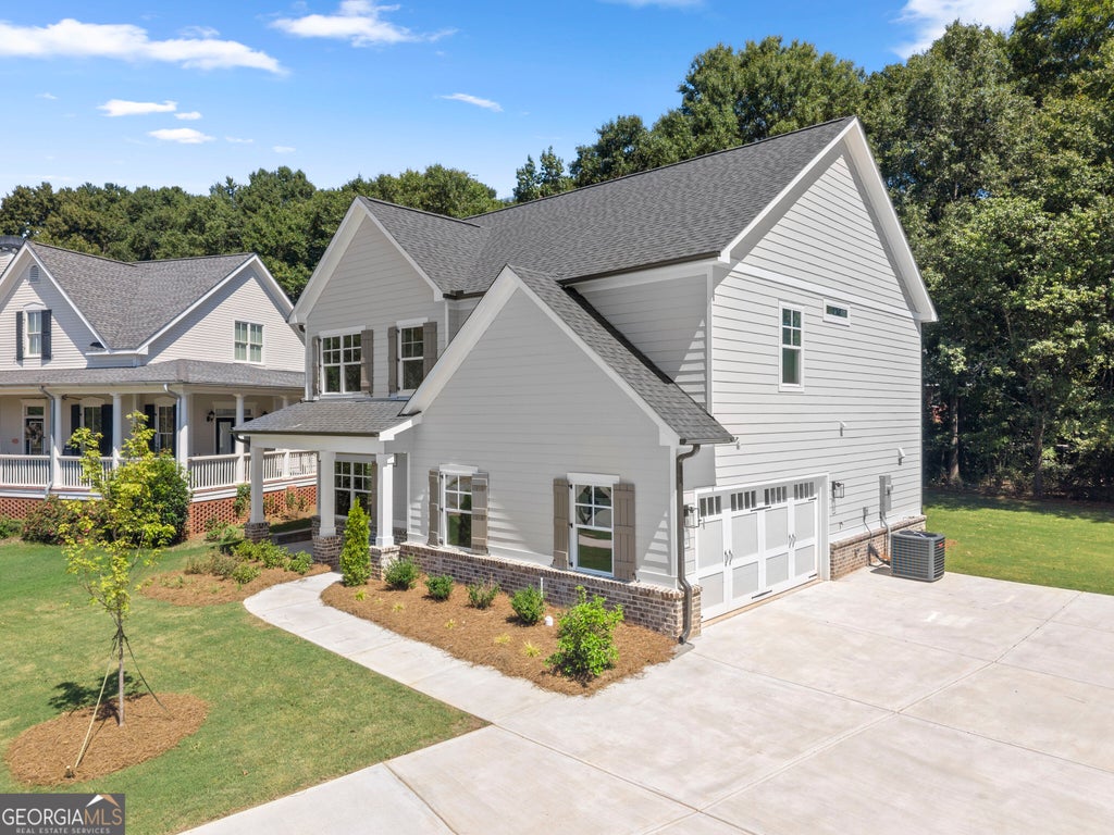 Photo of 4290 Brookhaven Drive SE, Covington, GA 30014 (MLS # 10866557)