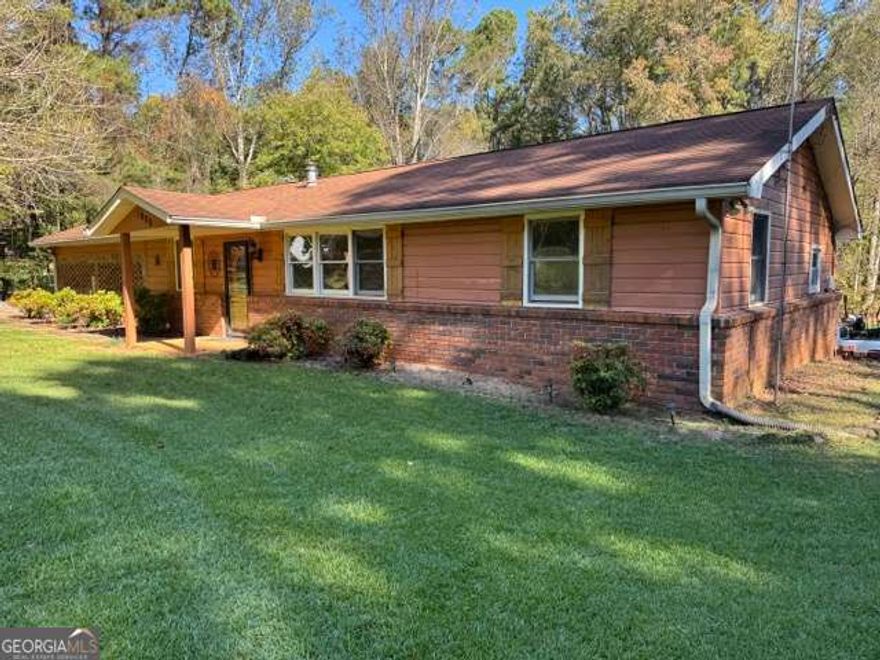 Motivated Sellers! Amazing investment opportunity in this home located in a prime Canton location!  Just 6 minutes to I-575 Express Lanes, 3 minutes to the future Holly Springs Town Center, 13 minutes to downtown Woodstock, and 13 minutes to downtown Canton.  Situated on a picturesque lot in a quiet residential area, this home has so much potential!  It features an open concept living room, dining room and kitchen with two bedrooms and two baths as well as a third room that could be used as a bedroom (does not have a closet).  Home is part of an estate and is being sold as-is, no disclosure.  This home is currently on a well, but can easily be connected to County water.  Cash buyers only please.