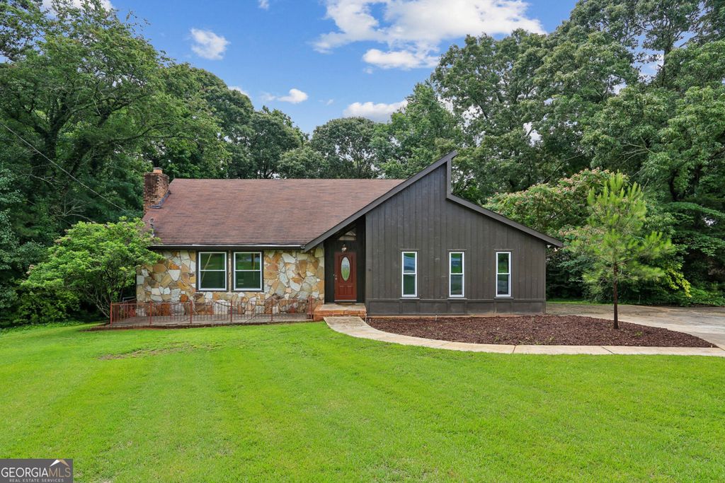 Photo of 5460 Chanterella Court SW, Lilburn, GA 30047 (MLS # 10774642)