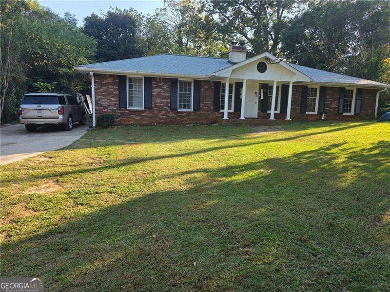 Photo of 5321 Hamilton Street, Stone Mountain, GA 30083 (MLS # 10877666)