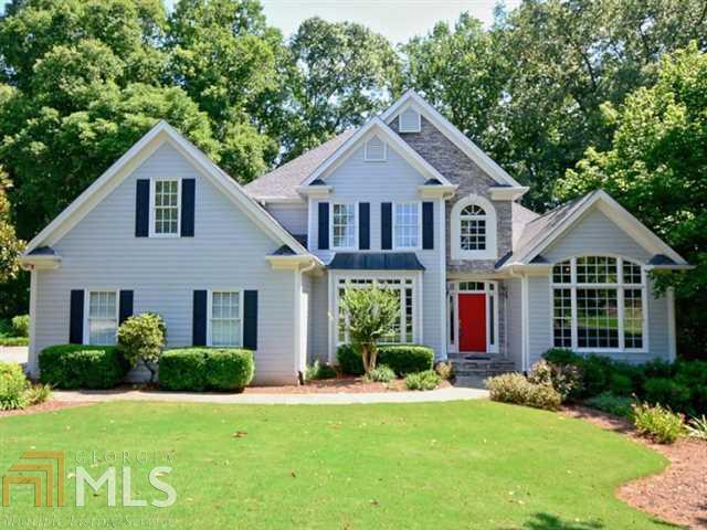 FIXER UPPER! Best Value in Bradshaw Farm - needs cosmetic overhaul - paint, carpet, finishes. 5BD/4BA. Master on the main. Finished bsmt. Open kitchen with quartz counters, glass front cabinets, island with new cooktop, built-in desk & bayed breakfast area. Dramatic 2-story family room offers fireplace flanked by built-ins & wall of windows with seasonal golf views. Terrace level suite with kitchen & private deck. New roof 2010, New HVAC bsmt ductwork 2013, New water heater 2015. Award winning schools & sought-after amenities! Instant equity - priced accordingly!